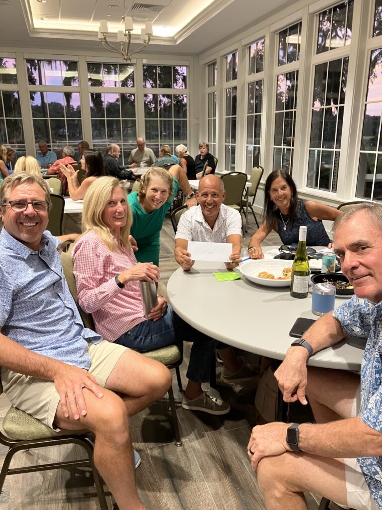 Members of the Einsteins on Wine with with their gift certificate for taking first place at Trivia Night at The Oaks.